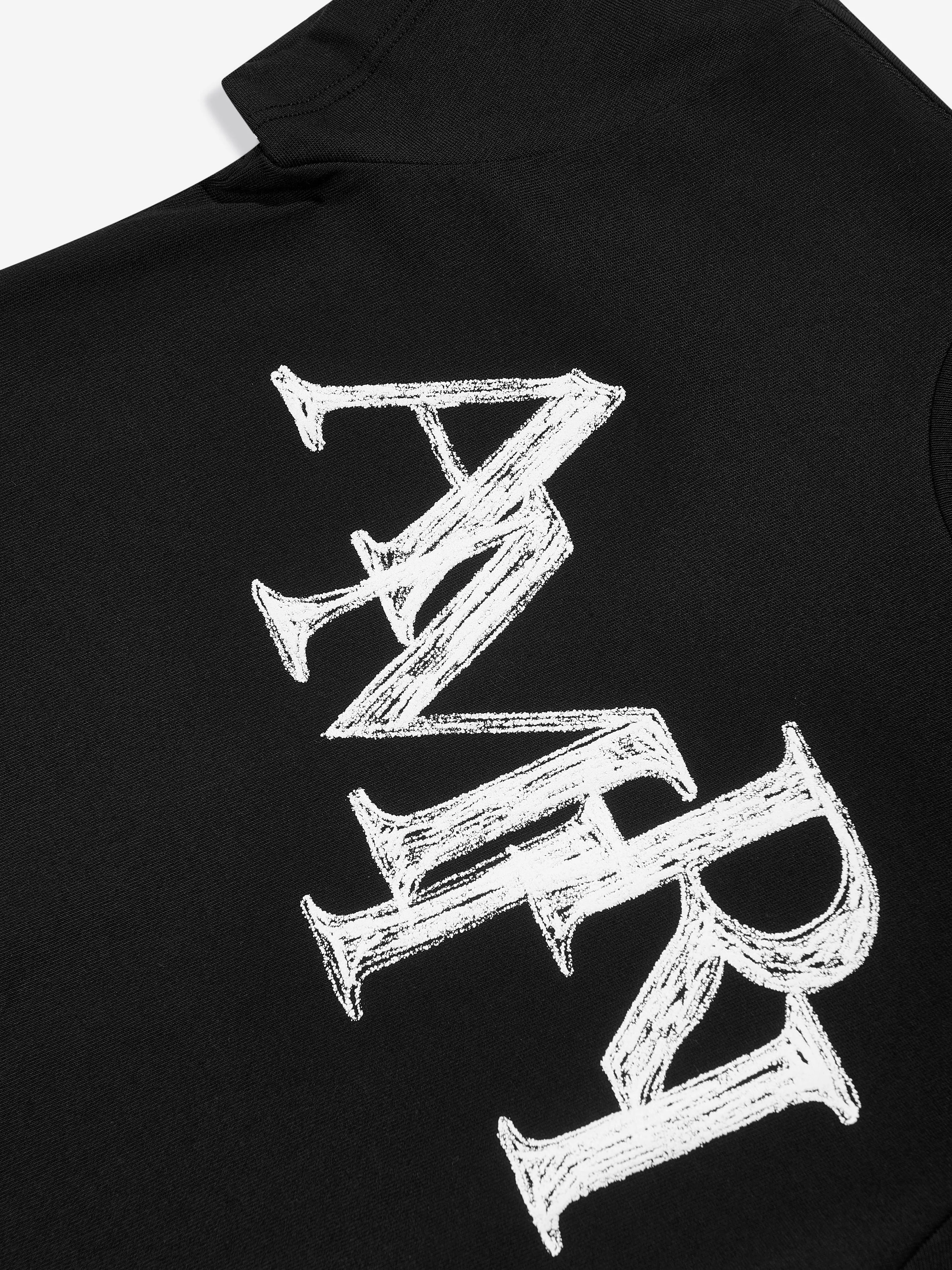 Amiri Kids Staggered Scribble Logo T-Shirt in Black