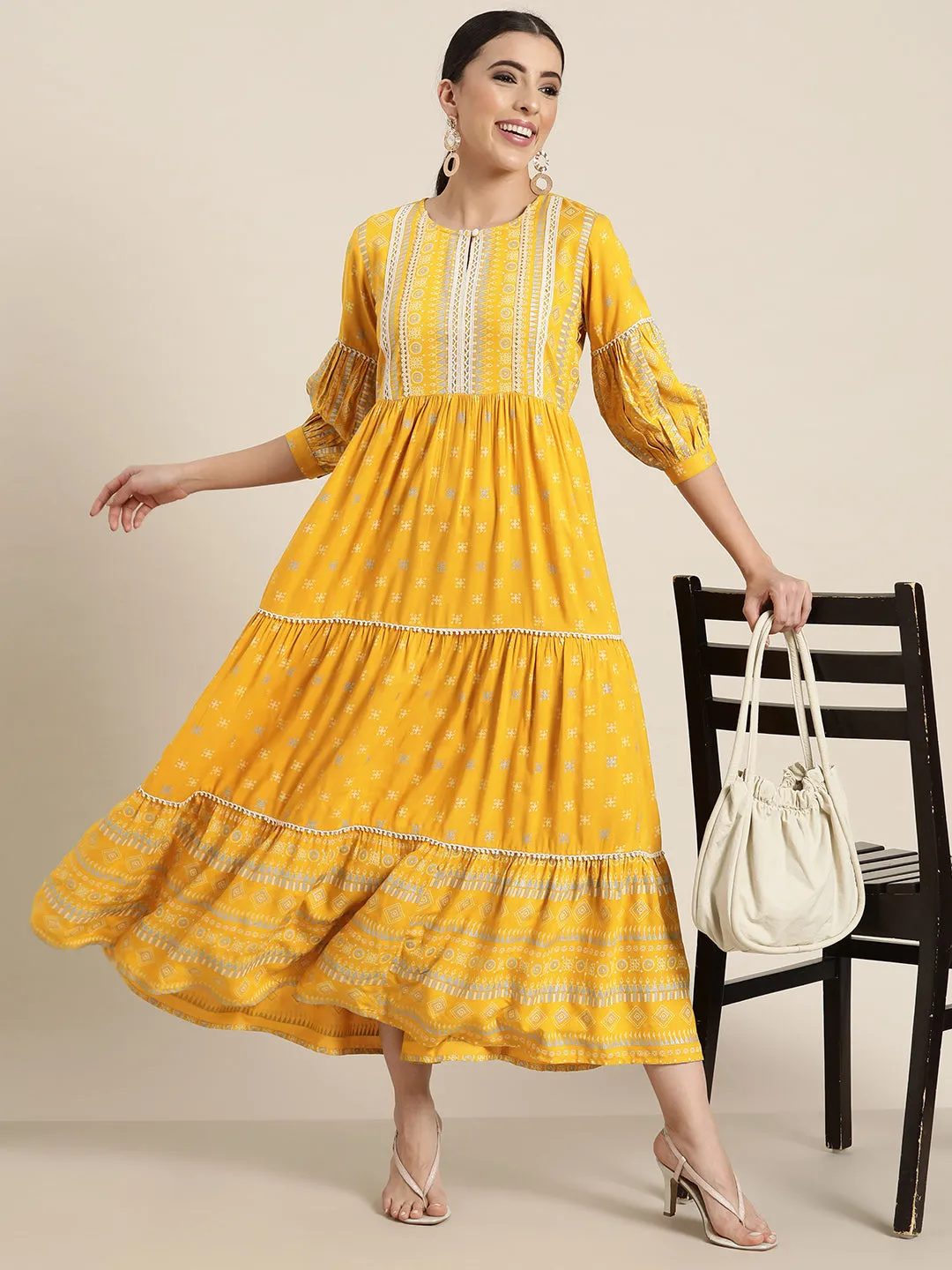 Jashvi Mustard Geometric Printed Rayon Tiered Maxi Dress With Buttons & Lace